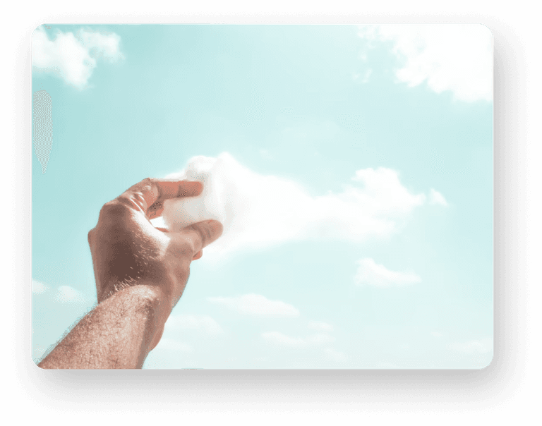 hand catching dreams and clouds 