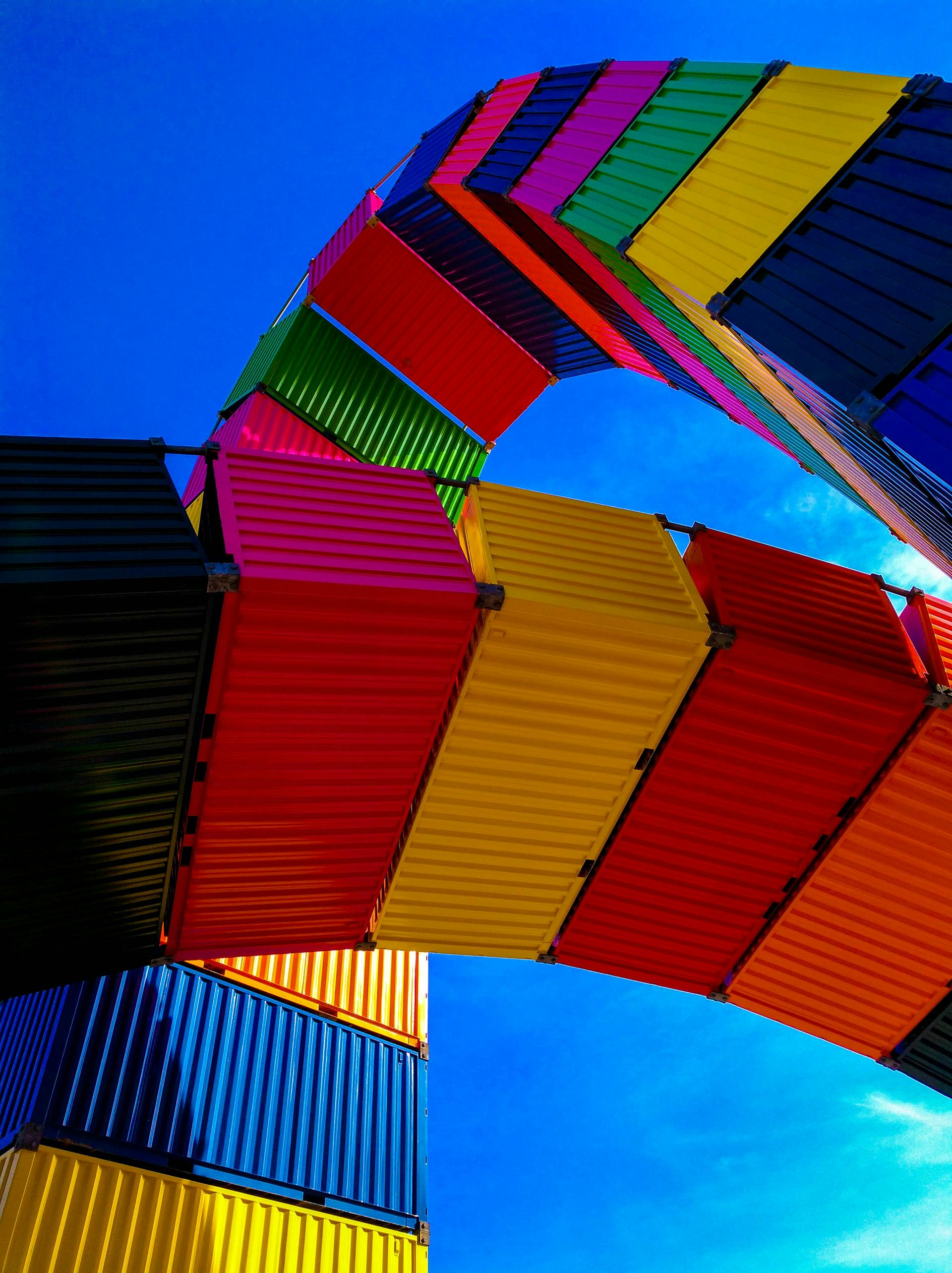 Image of colorful cargo boxes arranged in curved shapes
