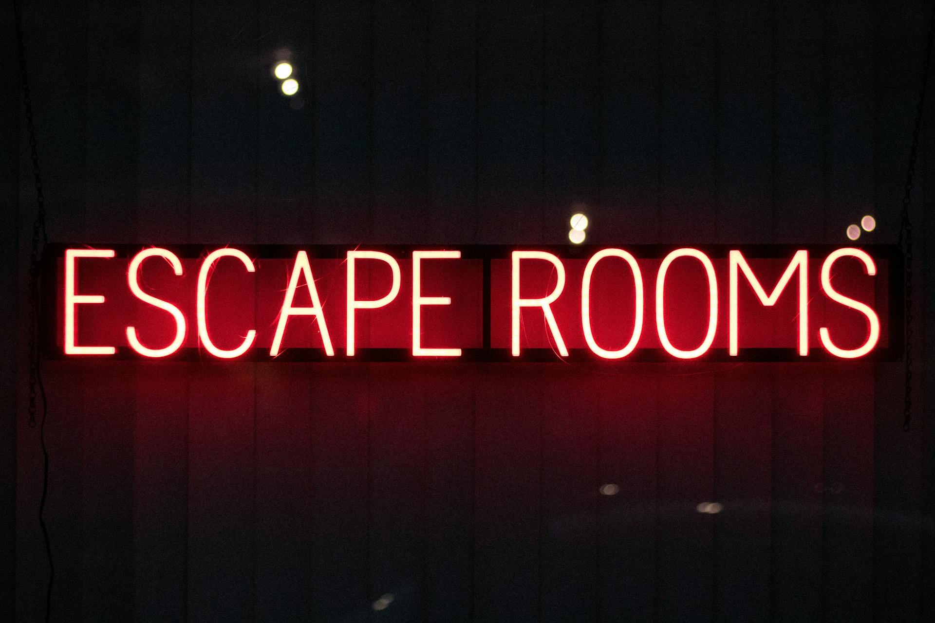 Neon lights reading Escpae Rooms